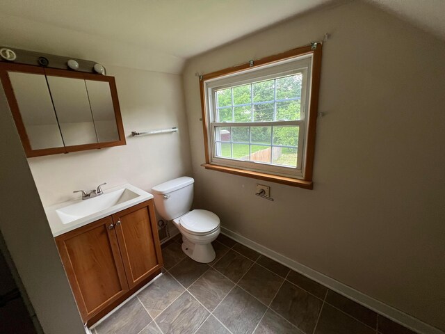 68 Moull St, Newark, OH 43055 - half bathroom featuring vanity and vaulted ceiling