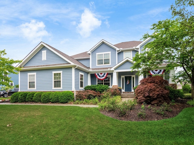 5808 Glendavon Loop, Dublin, OH 43016 - craftsman inspired home featuring a front lawn and a shingled roof