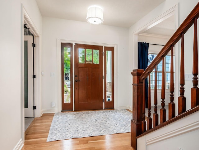 5808 Glendavon Loop, Dublin, OH 43016 - entrance foyer with light wood-type flooring and stairs