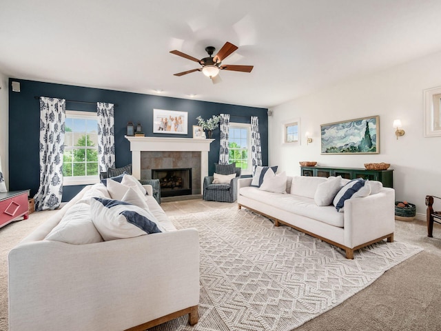 5808 Glendavon Loop, Dublin, OH 43016 - living area featuring light colored carpet, plenty of natural light, a ceiling fan, and a fireplace