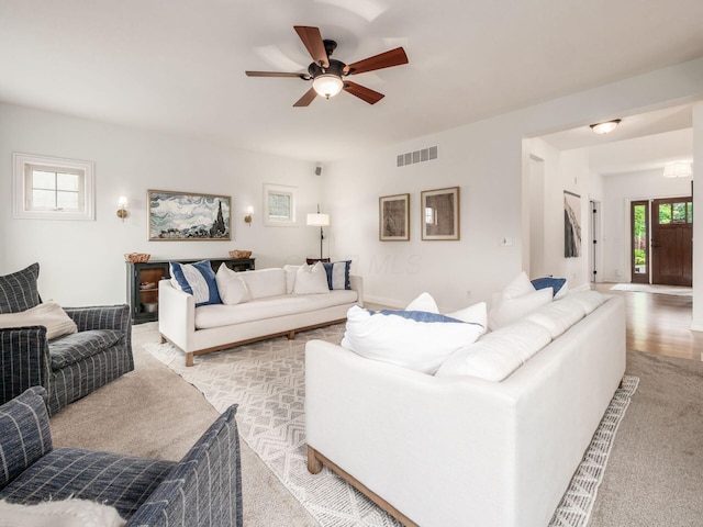 5808 Glendavon Loop, Dublin, OH 43016 - living room featuring a ceiling fan and light carpet