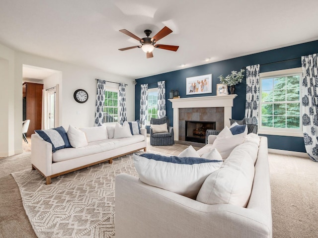 5808 Glendavon Loop, Dublin, OH 43016 - living area with carpet floors, ceiling fan, and a tile fireplace