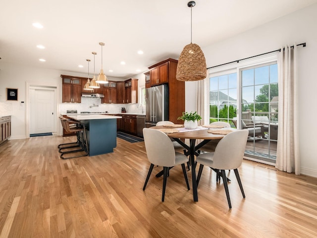 5808 Glendavon Loop, Dublin, OH 43016 - dining room featuring light wood-style floors and recessed lighting