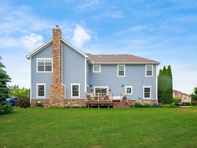5808 Glendavon Loop, Dublin, OH 43016 - back of property with a chimney, a deck, and a yard