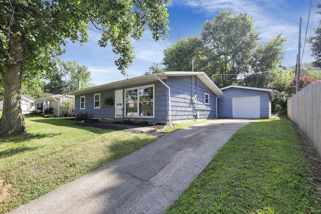 1614 Long St, Lancaster, OH 43130 - ranch-style house featuring a garage, asphalt driveway, and an outbuilding