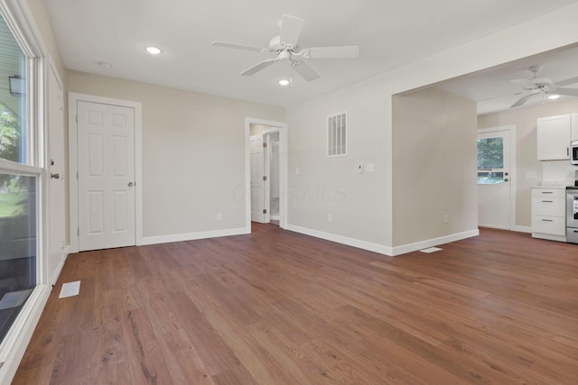 1614 Long St, Lancaster, OH 43130 - unfurnished living room with a ceiling fan, wood finished floors, and recessed lighting