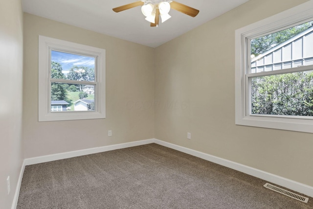 1614 Long St, Lancaster, OH 43130 - unfurnished room featuring carpet floors and a ceiling fan