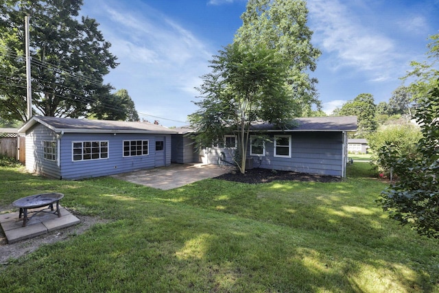 1614 Long St, Lancaster, OH 43130 - back of house with a fire pit, a patio area, and a yard