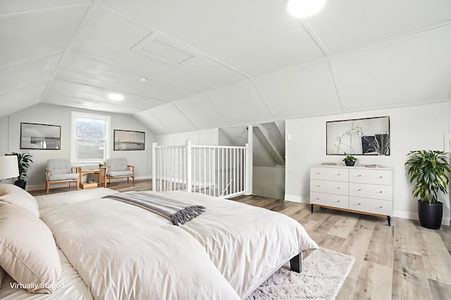 1693 Bide A Wee Park Ave, Columbus, OH 43205 - bedroom featuring wood finished floors and vaulted ceiling