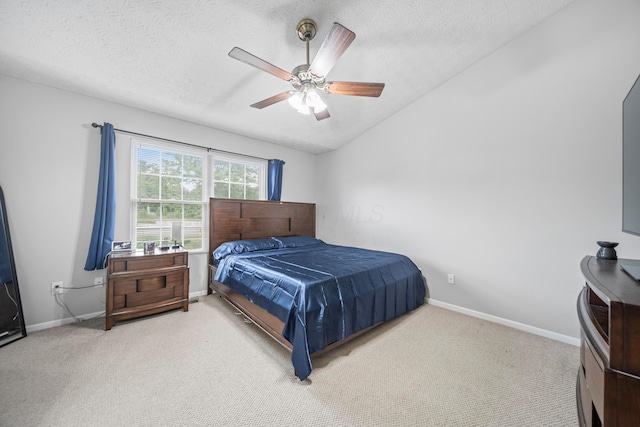 2986 E Powell Rd, Columbus, OH 43240 - bedroom featuring a textured ceiling, carpet, lofted ceiling, and a ceiling fan