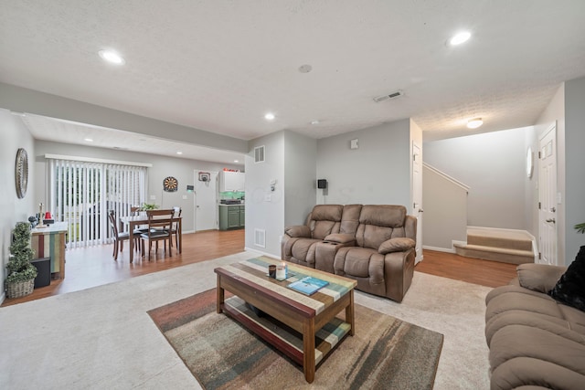 2986 E Powell Rd, Columbus, OH 43240 - living area with recessed lighting, light wood finished floors, and stairway