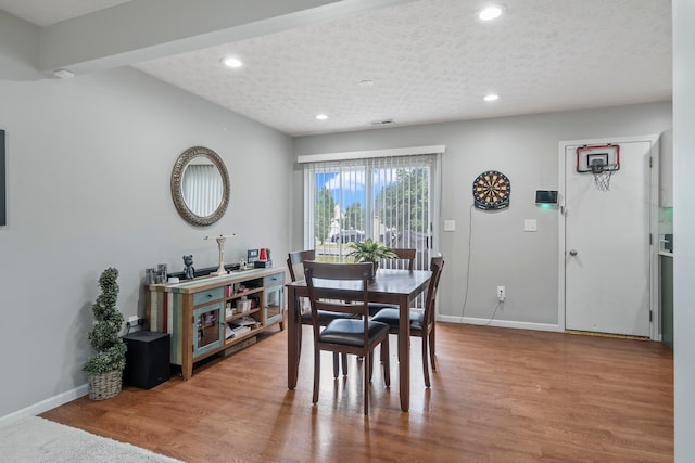 2986 E Powell Rd, Columbus, OH 43240 - dining room with recessed lighting, wood finished floors, and a textured ceiling