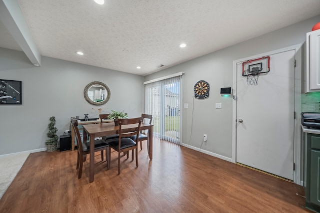 2986 E Powell Rd, Columbus, OH 43240 - dining space featuring recessed lighting, a textured ceiling, and wood finished floors
