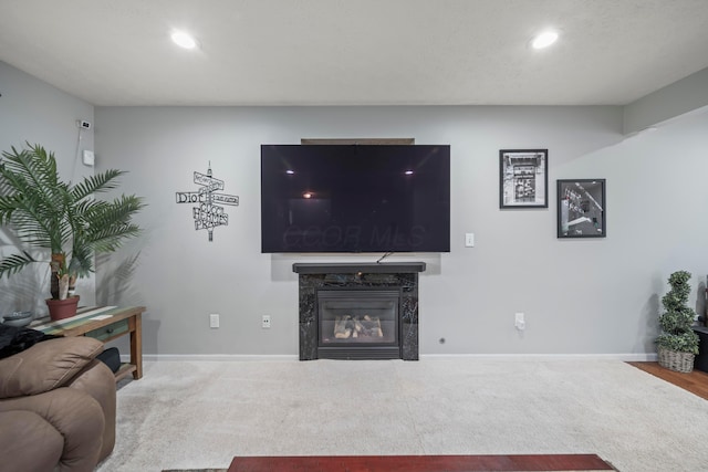 2986 E Powell Rd, Columbus, OH 43240 - living area with recessed lighting, carpet, and a tile fireplace