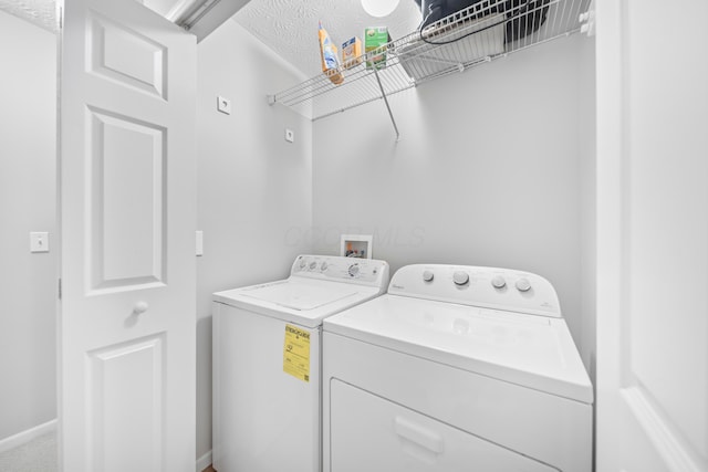 2986 E Powell Rd, Columbus, OH 43240 - washroom with independent washer and dryer and a textured ceiling