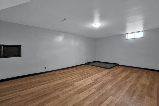 4974 Silverton Dr, Columbus, OH 43232 - basement featuring wood finished floors and baseboards