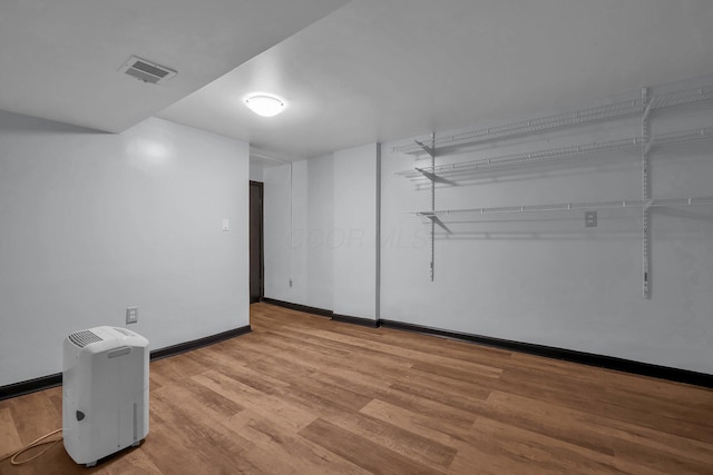 4974 Silverton Dr, Columbus, OH 43232 - unfurnished room featuring wood finished floors and baseboards