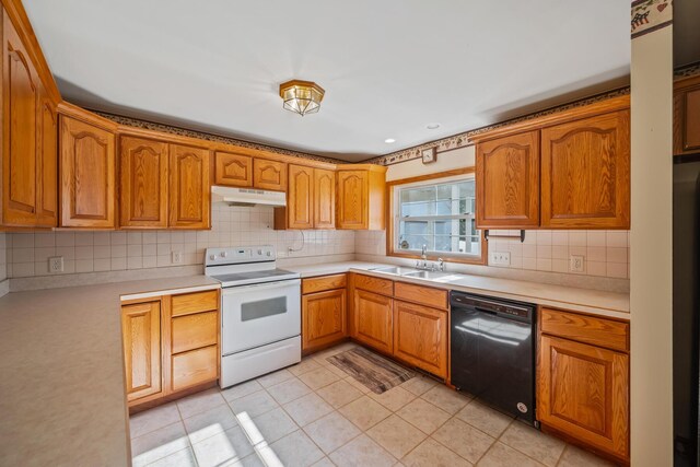 768 Barks Rd E, Marion, OH 43302 - kitchen featuring white electric range, dishwasher, under cabinet range hood, and light countertops