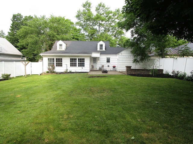 112 N Cherry St, Mount Gilead, OH 43338 - rear view of house featuring a fenced backyard and a patio