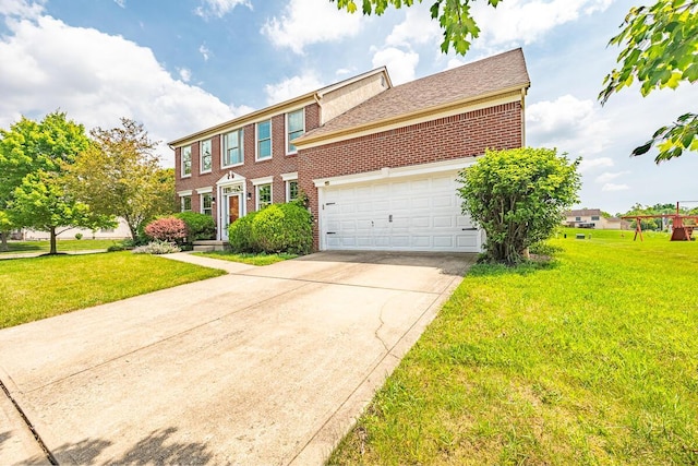 8510 Morgan St, Pickerington, OH 43147 - view of front of home featuring brick siding, a front yard, concrete driveway, and a garage
