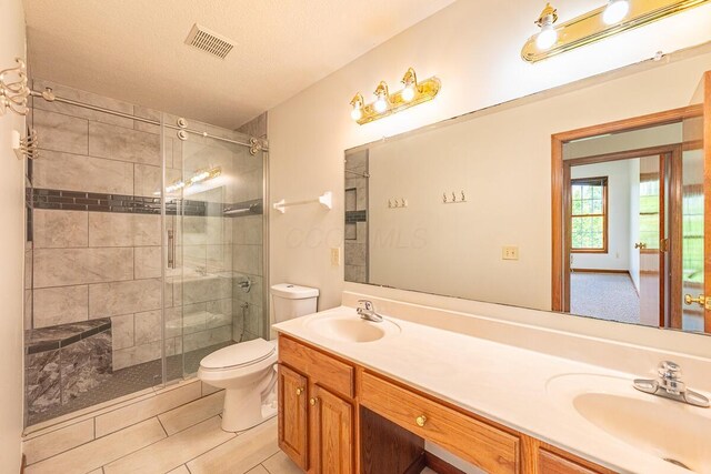 8510 Morgan St, Pickerington, OH 43147 - bathroom with double vanity, a stall shower, and tile patterned flooring