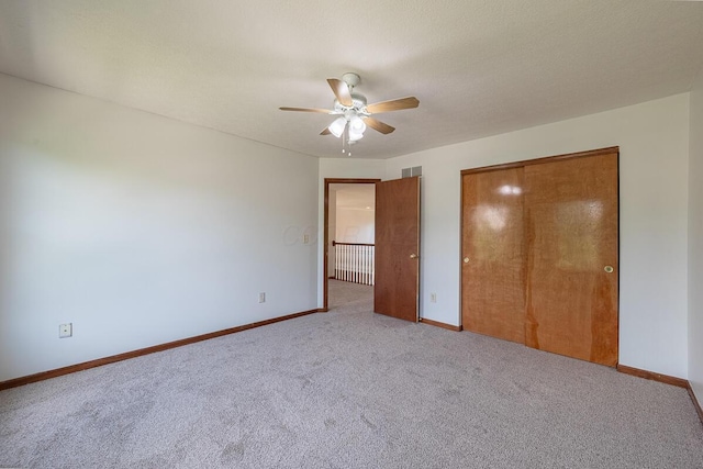 8510 Morgan St, Pickerington, OH 43147 - unfurnished bedroom featuring carpet flooring, a closet, and a ceiling fan