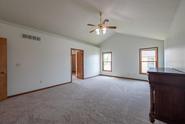8510 Morgan St, Pickerington, OH 43147 - empty room featuring ceiling fan, light carpet, and lofted ceiling