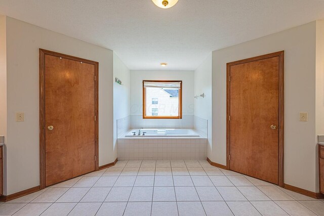 8510 Morgan St, Pickerington, OH 43147 - bathroom featuring a bath and tile patterned floors