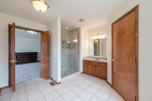 8510 Morgan St, Pickerington, OH 43147 - bathroom featuring vanity, tile patterned flooring, and a stall shower
