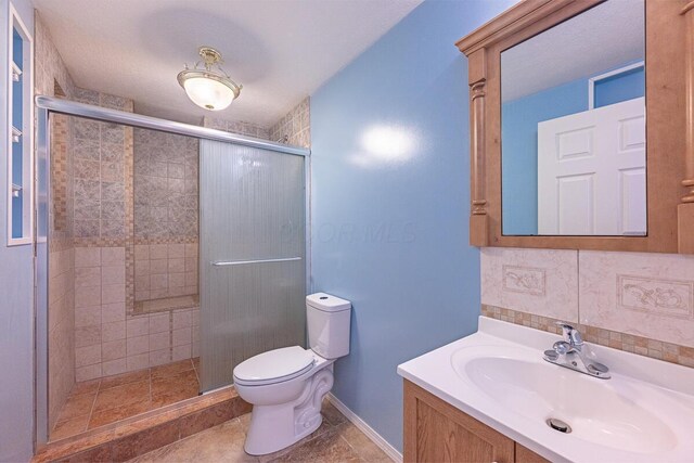 8510 Morgan St, Pickerington, OH 43147 - full bathroom with a shower stall, vanity, and backsplash