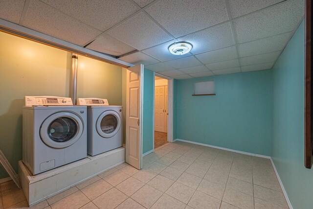 8510 Morgan St, Pickerington, OH 43147 - laundry room with washer and clothes dryer and tile patterned floors