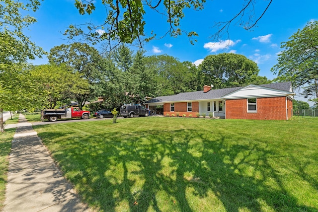 2812 N Star Rd, Columbus, OH 43221 - view of front facade featuring brick siding and a chimney
