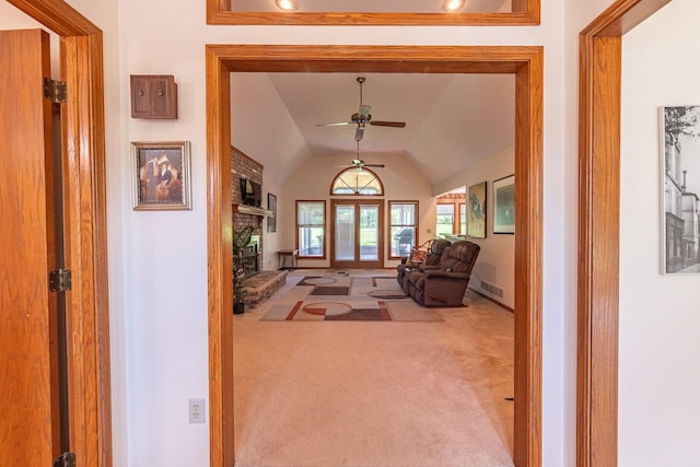 5608 Lynx Dr, Westerville, OH 43081 - living room featuring carpet, ceiling fan, a fireplace, and vaulted ceiling