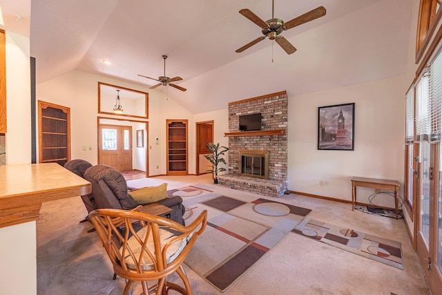 5608 Lynx Dr, Westerville, OH 43081 - living area with ceiling fan, plenty of natural light, a fireplace, carpet, and high vaulted ceiling
