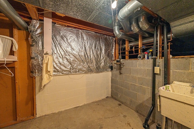 5608 Lynx Dr, Westerville, OH 43081 - unfinished basement featuring a sink