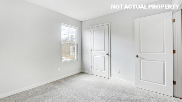 1415 Gimbles Dr, Columbus, OH 43223 - unfurnished bedroom featuring baseboards and carpet flooring