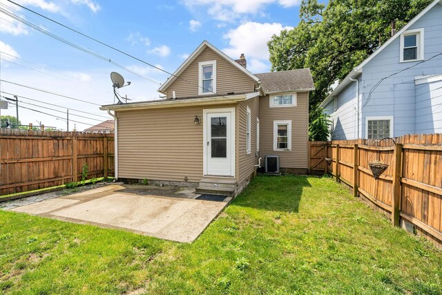 442 Thurman Ave, Columbus, OH 43206 - back of house with entry steps, a patio, a fenced backyard, and a chimney