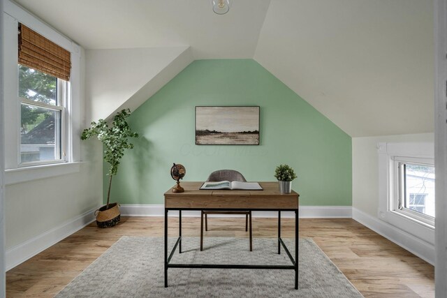 442 Thurman Ave, Columbus, OH 43206 - home office featuring light wood-style flooring and lofted ceiling