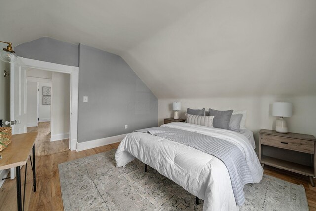 442 Thurman Ave, Columbus, OH 43206 - bedroom with vaulted ceiling and wood finished floors