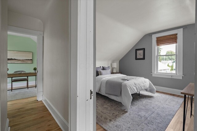 442 Thurman Ave, Columbus, OH 43206 - bedroom featuring wood finished floors and lofted ceiling