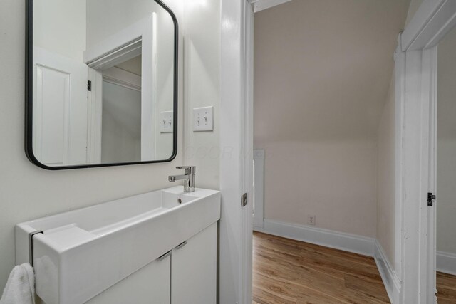 442 Thurman Ave, Columbus, OH 43206 - bathroom with wood finished floors and vanity