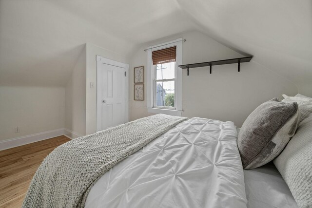 442 Thurman Ave, Columbus, OH 43206 - bedroom with lofted ceiling and wood finished floors