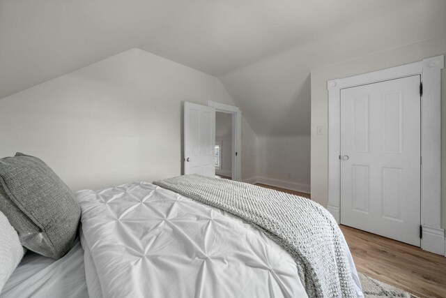 442 Thurman Ave, Columbus, OH 43206 - bedroom with lofted ceiling and light wood-type flooring
