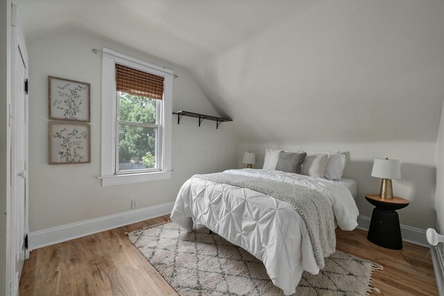 442 Thurman Ave, Columbus, OH 43206 - bedroom with lofted ceiling and wood finished floors