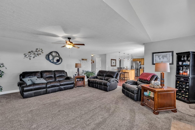 1626 Geranium Dr, Lewis Center, OH 43035 - carpeted living area with ceiling fan and a textured ceiling