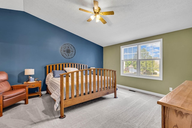 1626 Geranium Dr, Lewis Center, OH 43035 - carpeted bedroom with vaulted ceiling, ceiling fan, and a textured ceiling