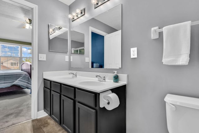 1626 Geranium Dr, Lewis Center, OH 43035 - full bathroom featuring connected bathroom, double vanity, a ceiling fan, and tile patterned floors