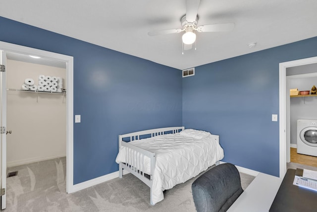 1626 Geranium Dr, Lewis Center, OH 43035 - carpeted bedroom featuring washer / dryer, a spacious closet, a closet, and ceiling fan