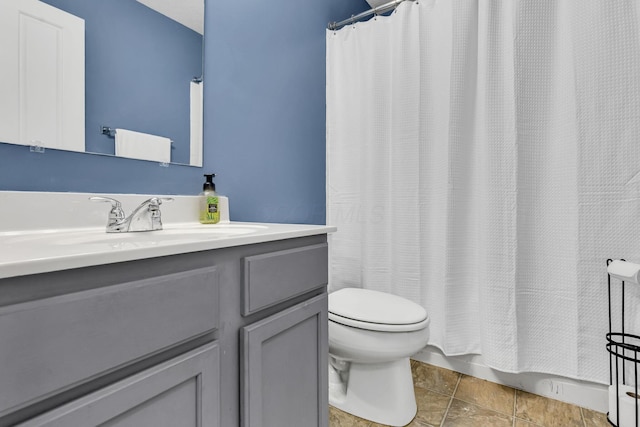1626 Geranium Dr, Lewis Center, OH 43035 - full bath featuring vanity, curtained shower, and stone finish floors