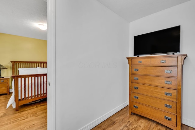 1626 Geranium Dr, Lewis Center, OH 43035 - bedroom featuring light wood finished floors and baseboards